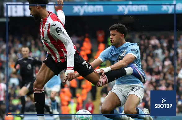 SBOTOP: Penalty Fury Overshadows Man City’s 3-0 Victory as Keith Andrews Questions Three Key Decisions Favoring Guardiola’s Side